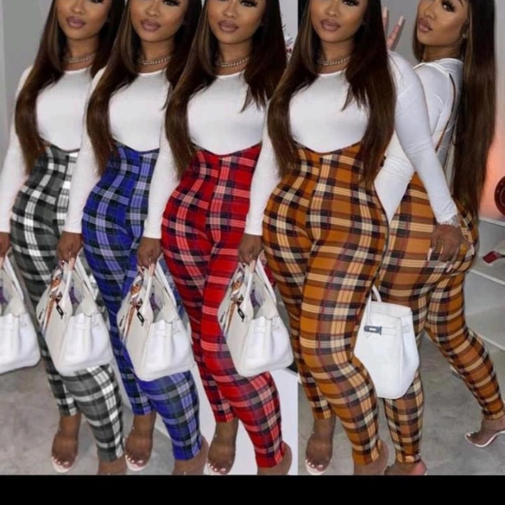 Two piece jumpsuit with a white shirt with it